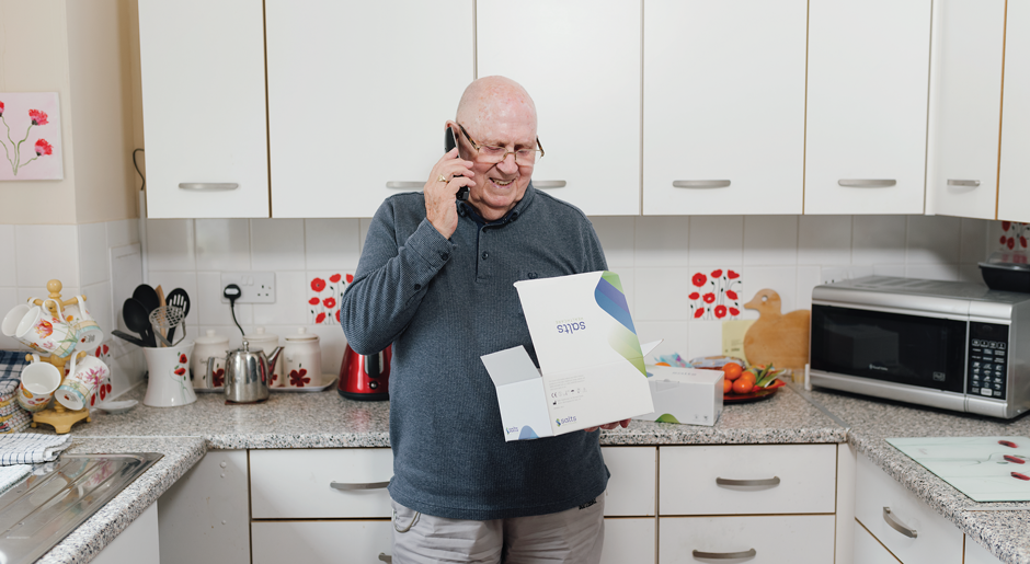 Man on the phone to Medilink Customer Services
